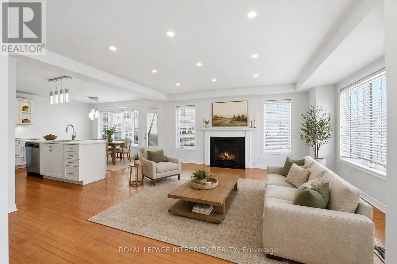 Living room/kitchen virtually staged.
