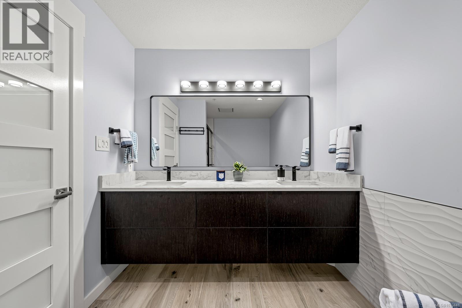 #305 2275 Comox Ave - 31