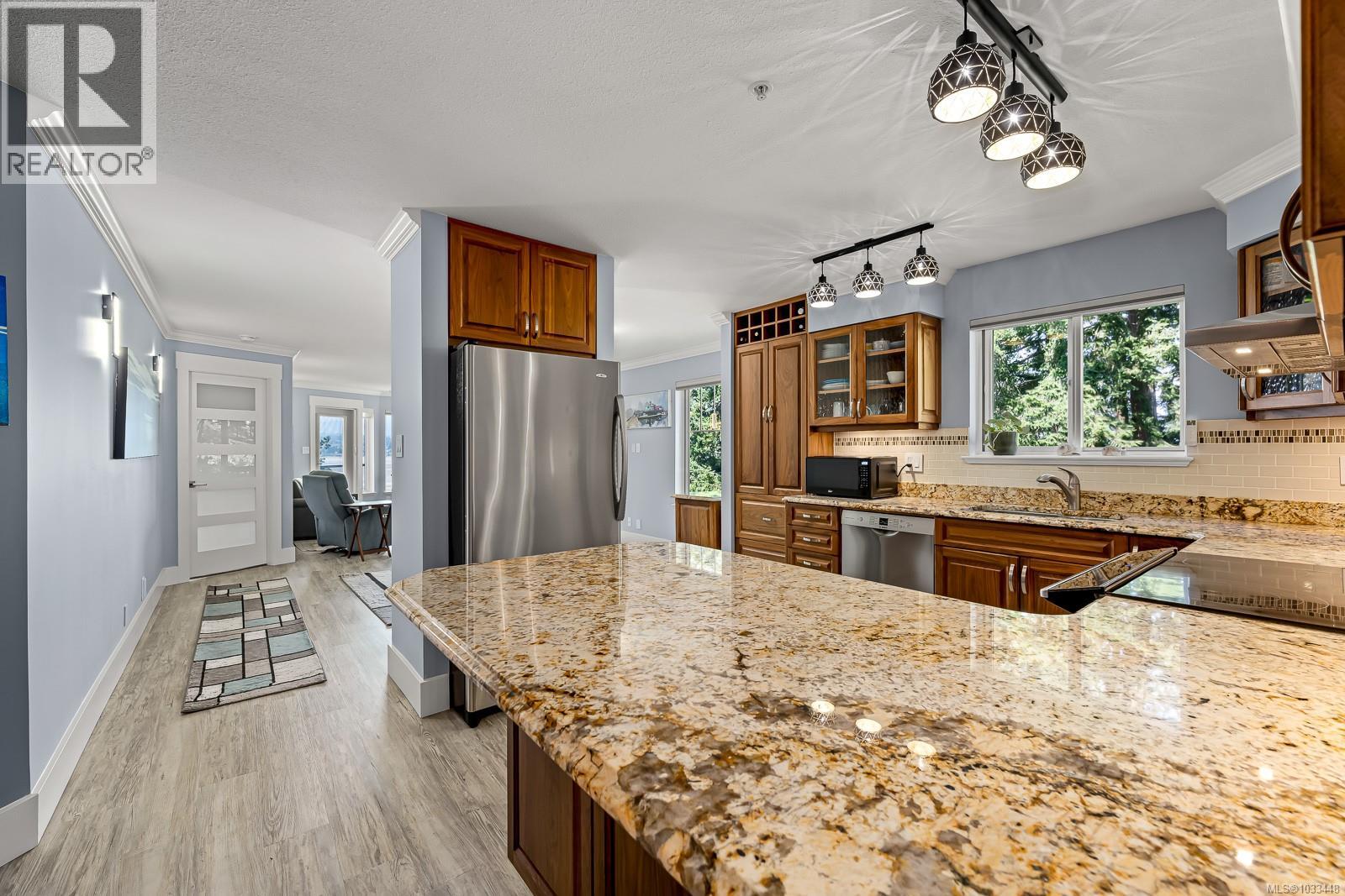 #305 2275 Comox Ave - 4