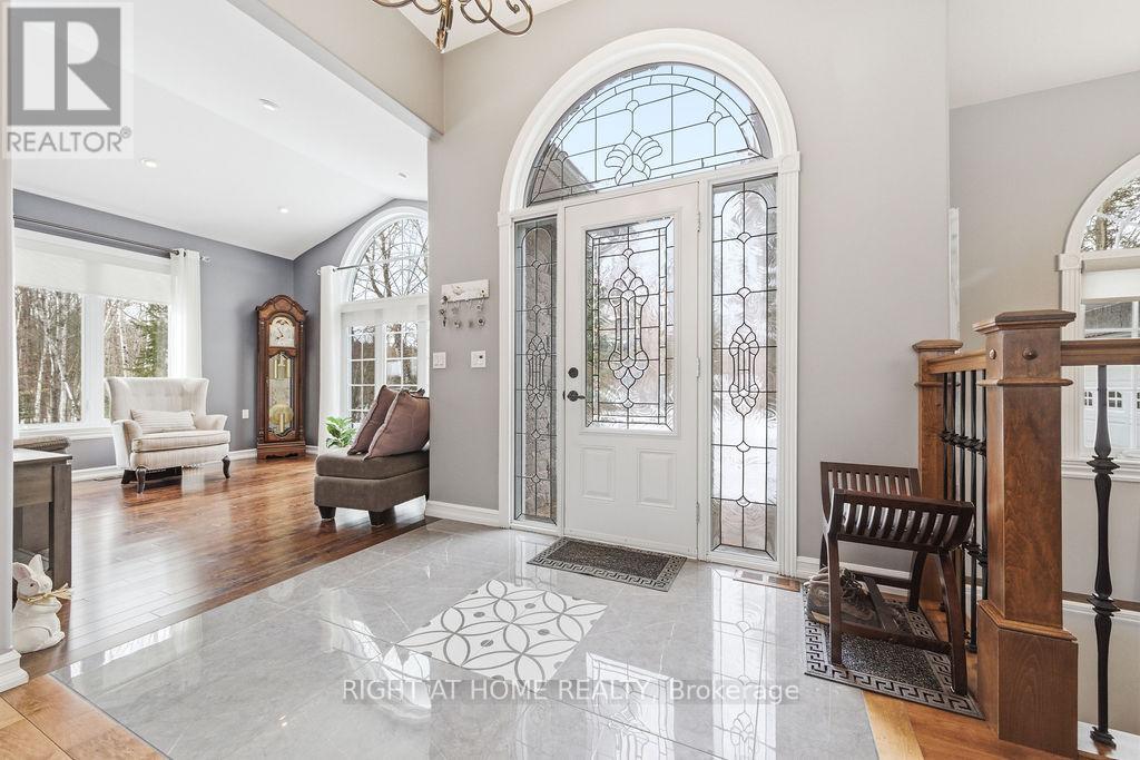 Inviting Foyer with Bright Front Doors