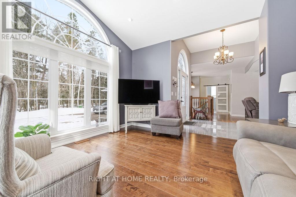 Amazing Family Room with Floor to Ceiling Window