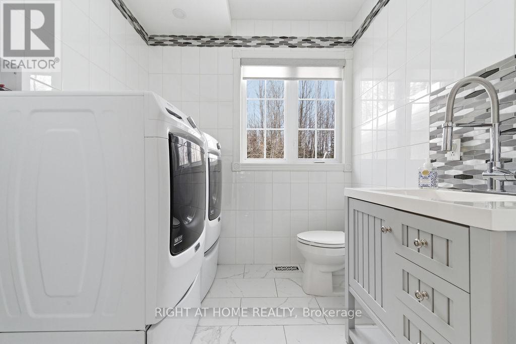Main Floor Laundry shared with Powder Room