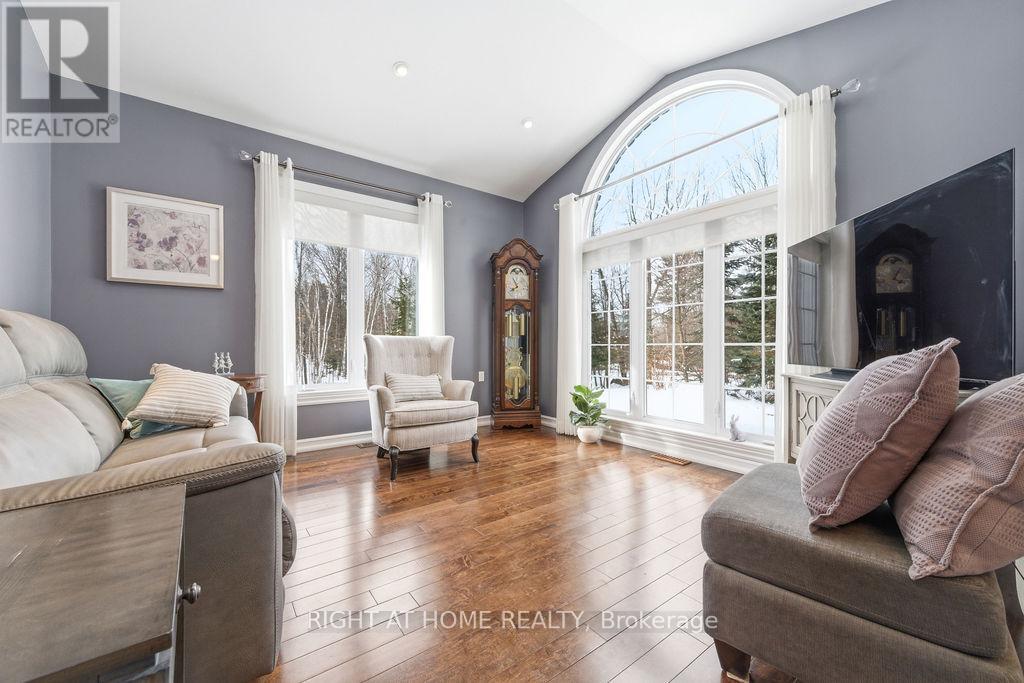 Gleaming Hardwood Floors and Vaulted Ceiling