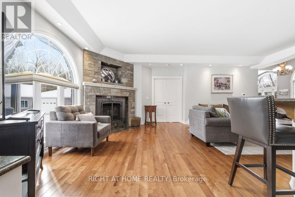 Living Room / Arched Window Overlooking Backyard