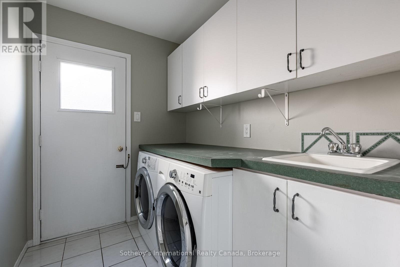 Laundry room with access to garage