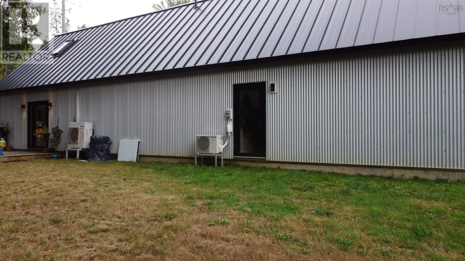 Back of Apartments and Garage