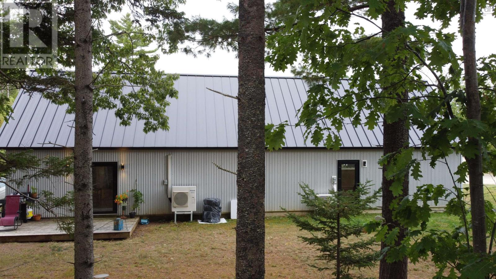 Back of Garage and apartments