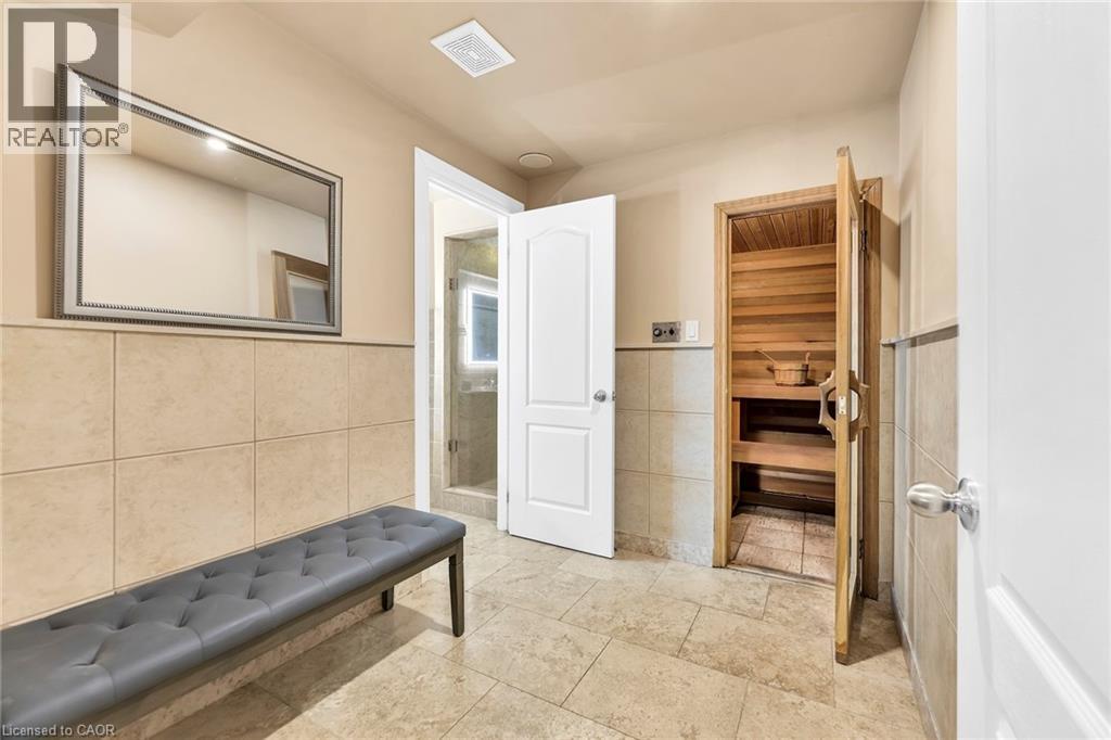 Dedicated sauna featuring natural wood interior