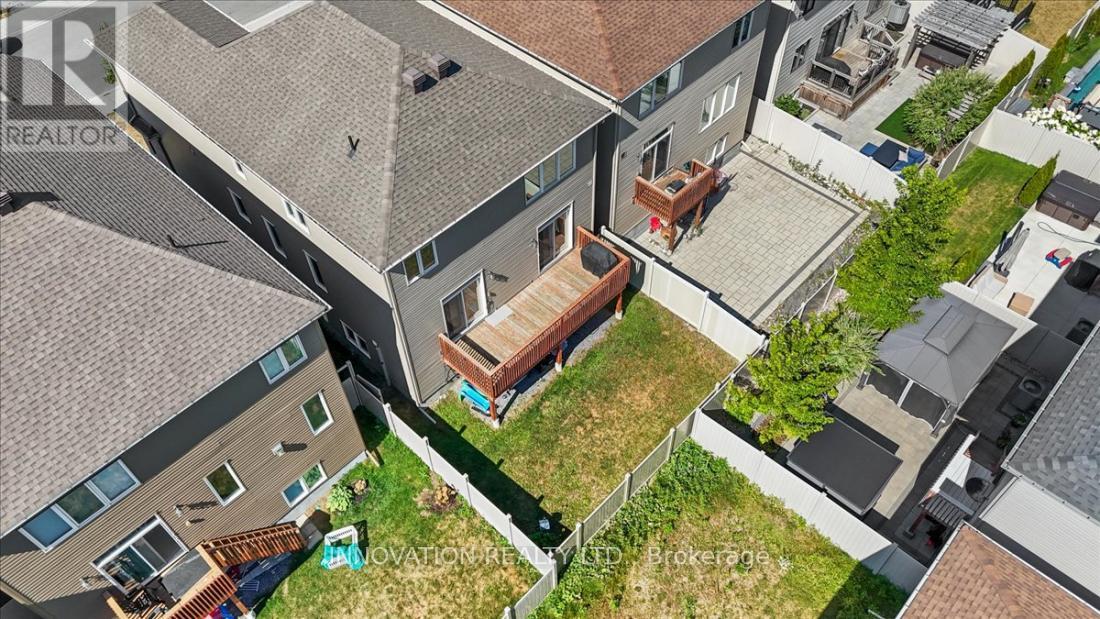 Great yard with raised deck & PVC fence