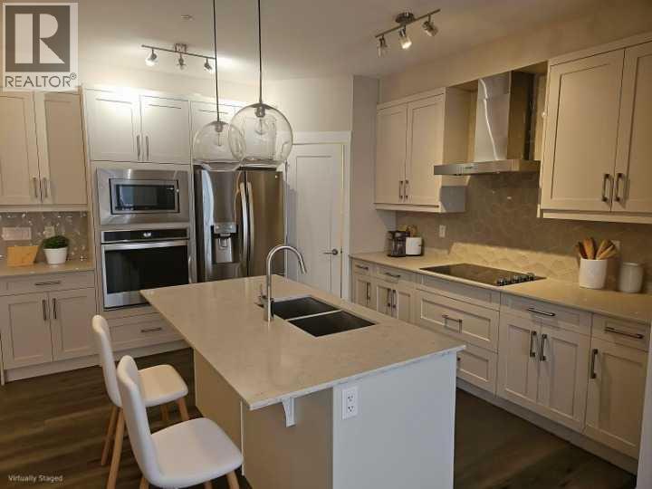 217, 30 Walgrove Walk SE — photo 2
