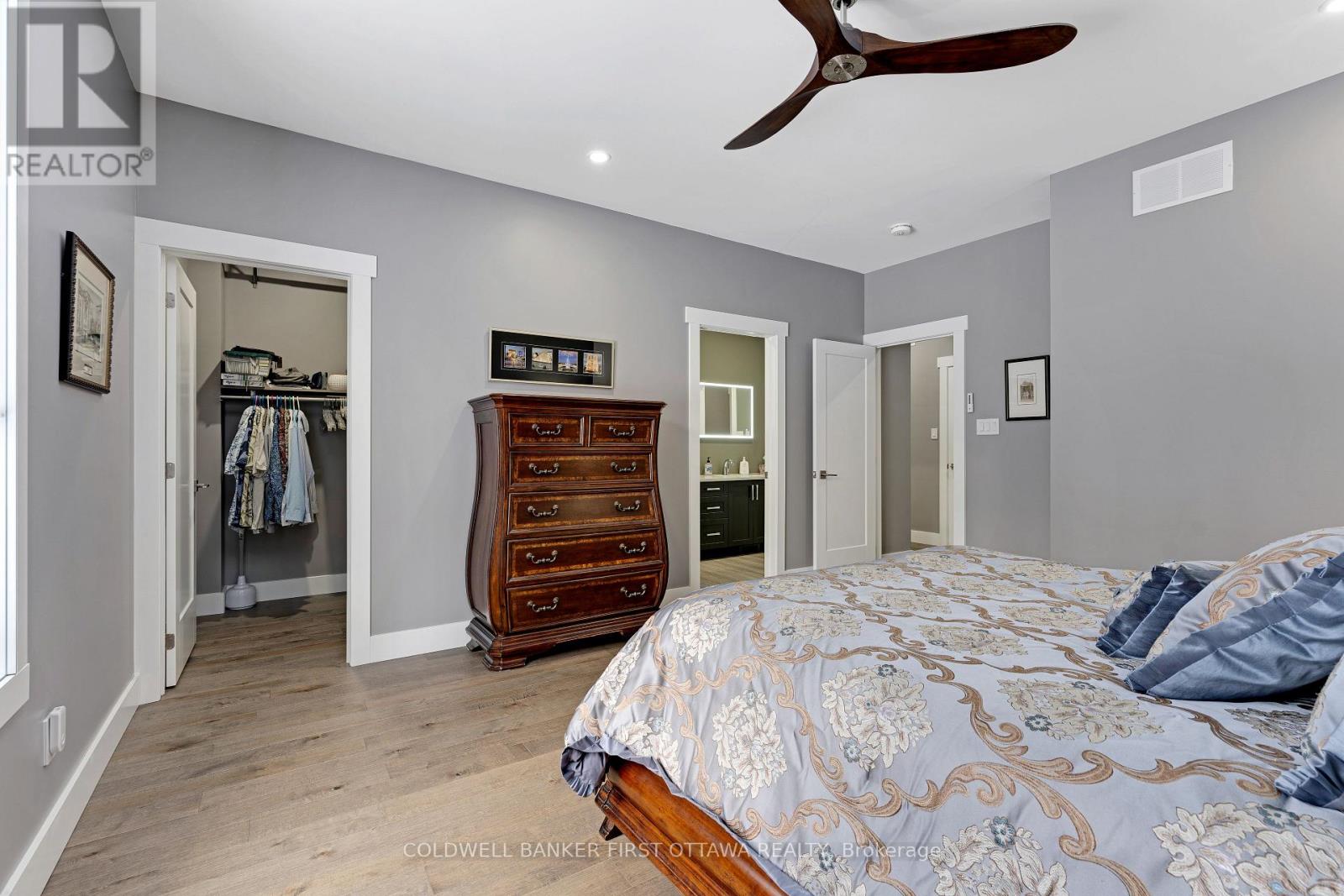 Second bedrm walk-in closet; & door to main bathrm
