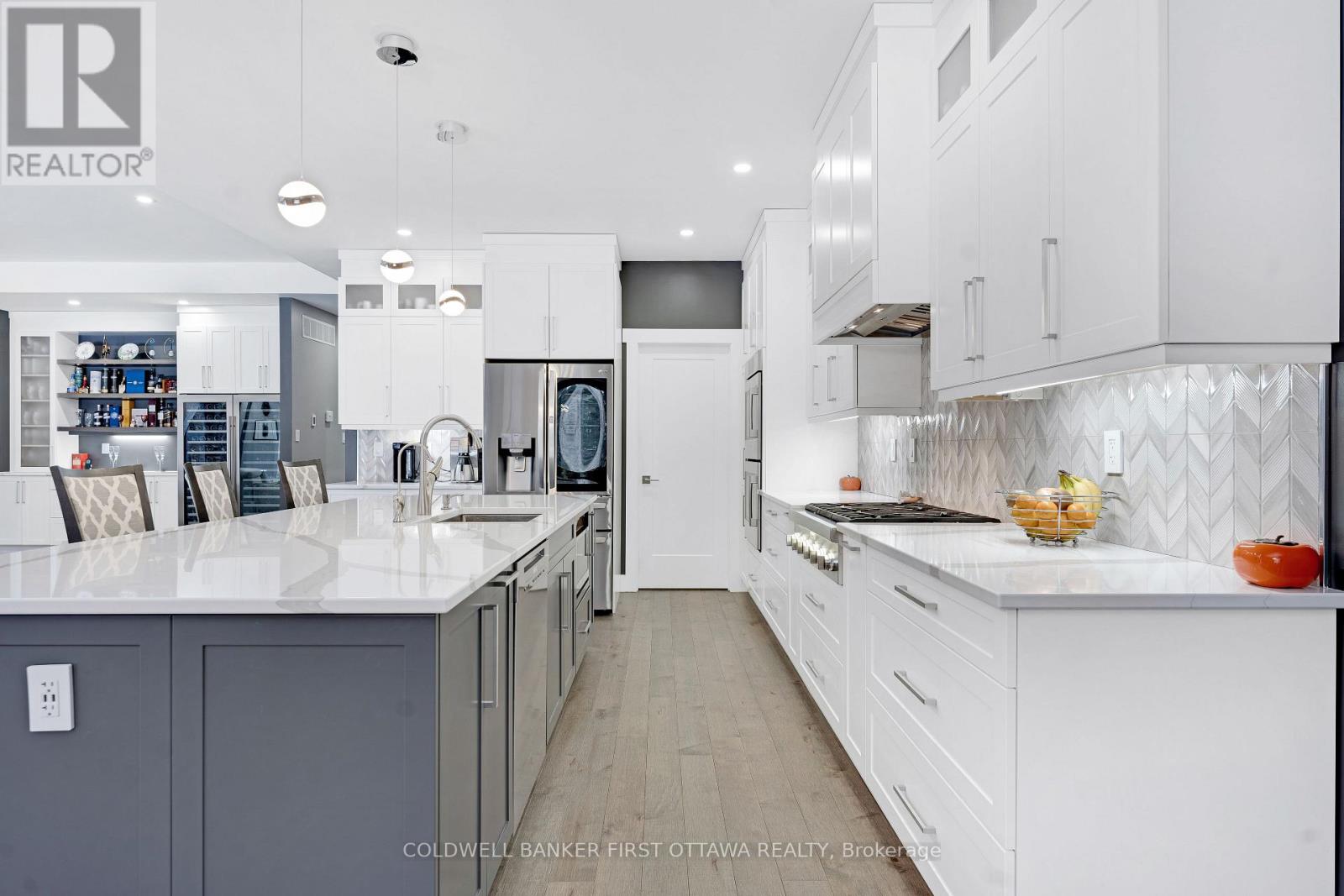 Ceramic herringbone backsplash. Walk-in pantry