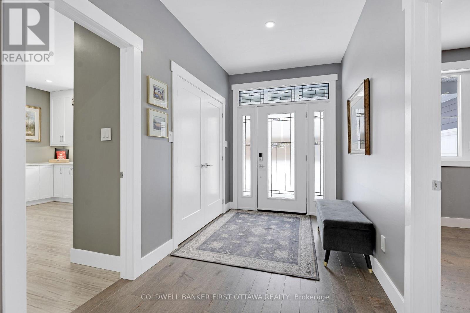 Sunny large foyer with double closet