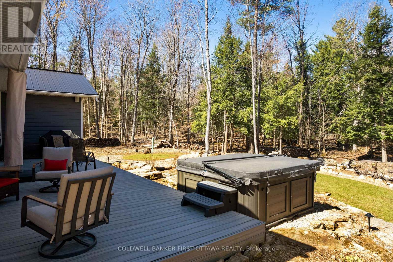 Deck's Artic Spa salt-water hot tub seats seven