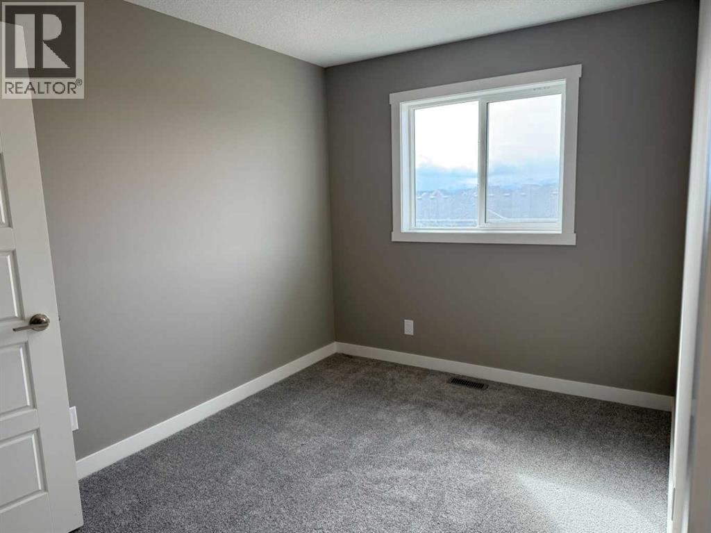 24 Sundown Place, Cochrane