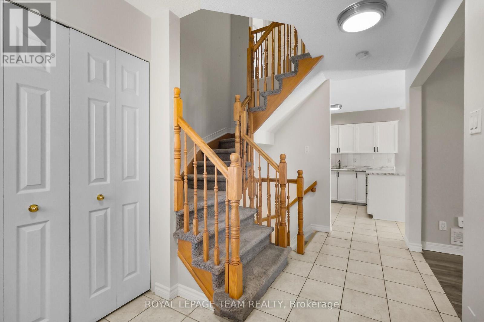 LR to the right, Oak Bannister, Kitchen ahead