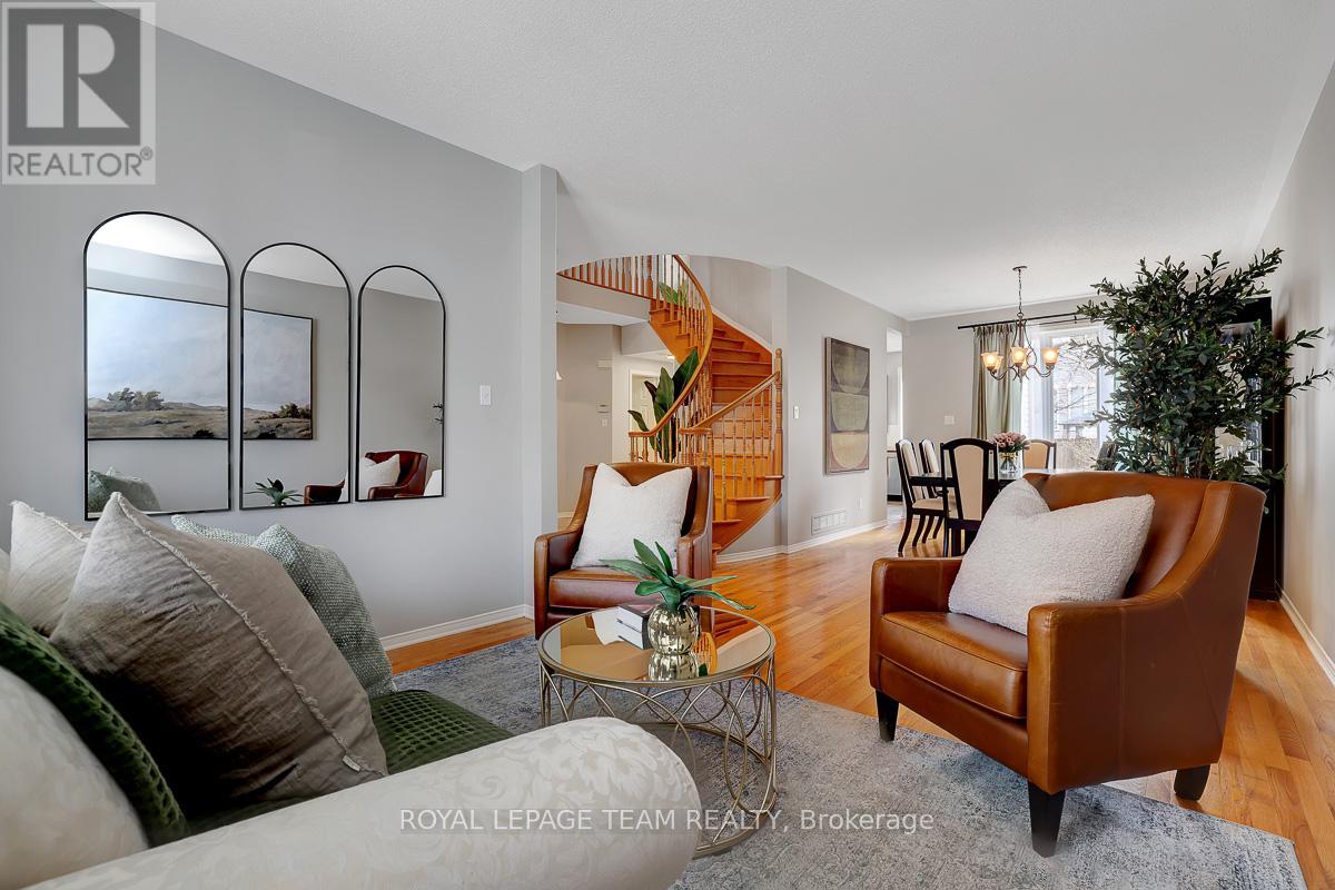 The great room is the formal living + dining rooms