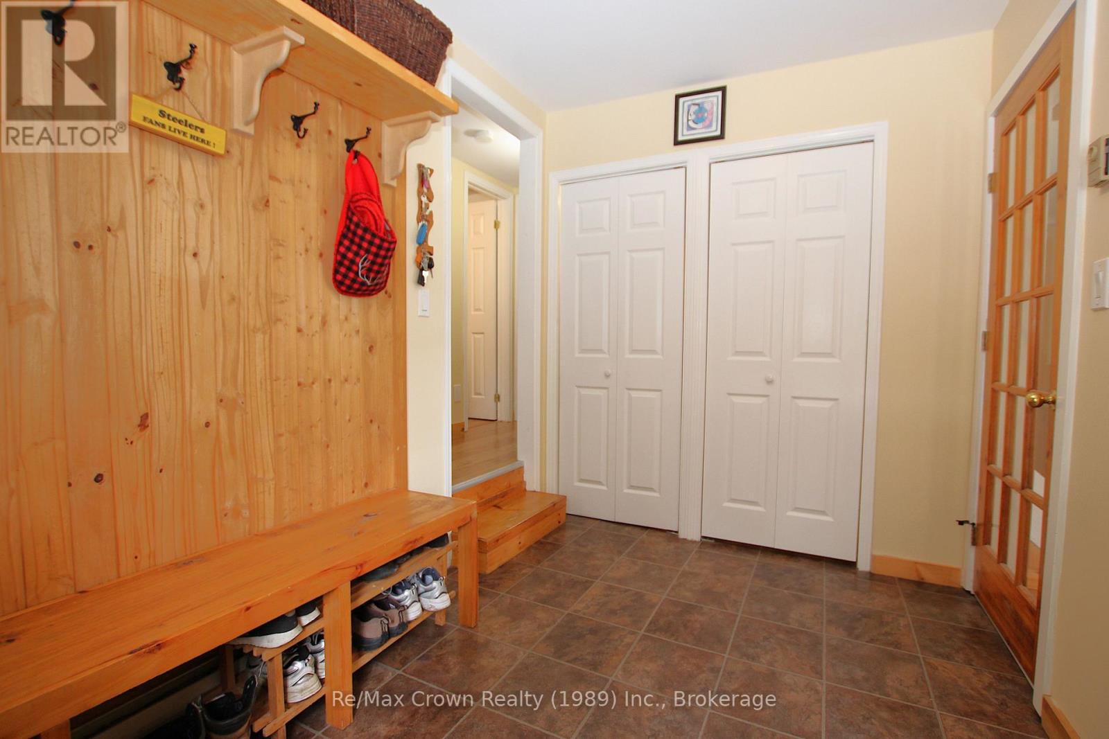 Foyer entrance with storage and W/I pantry