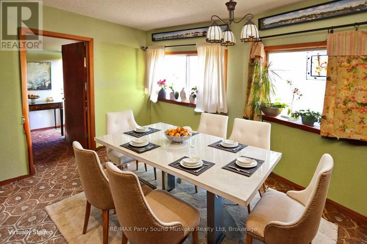 Unit 2 dining, staged
