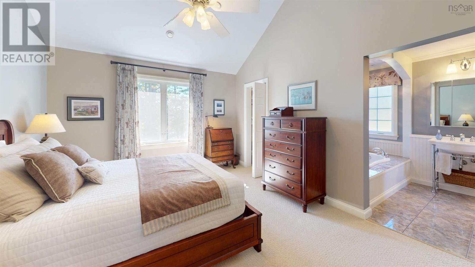 Primary bedroom with walk in closet