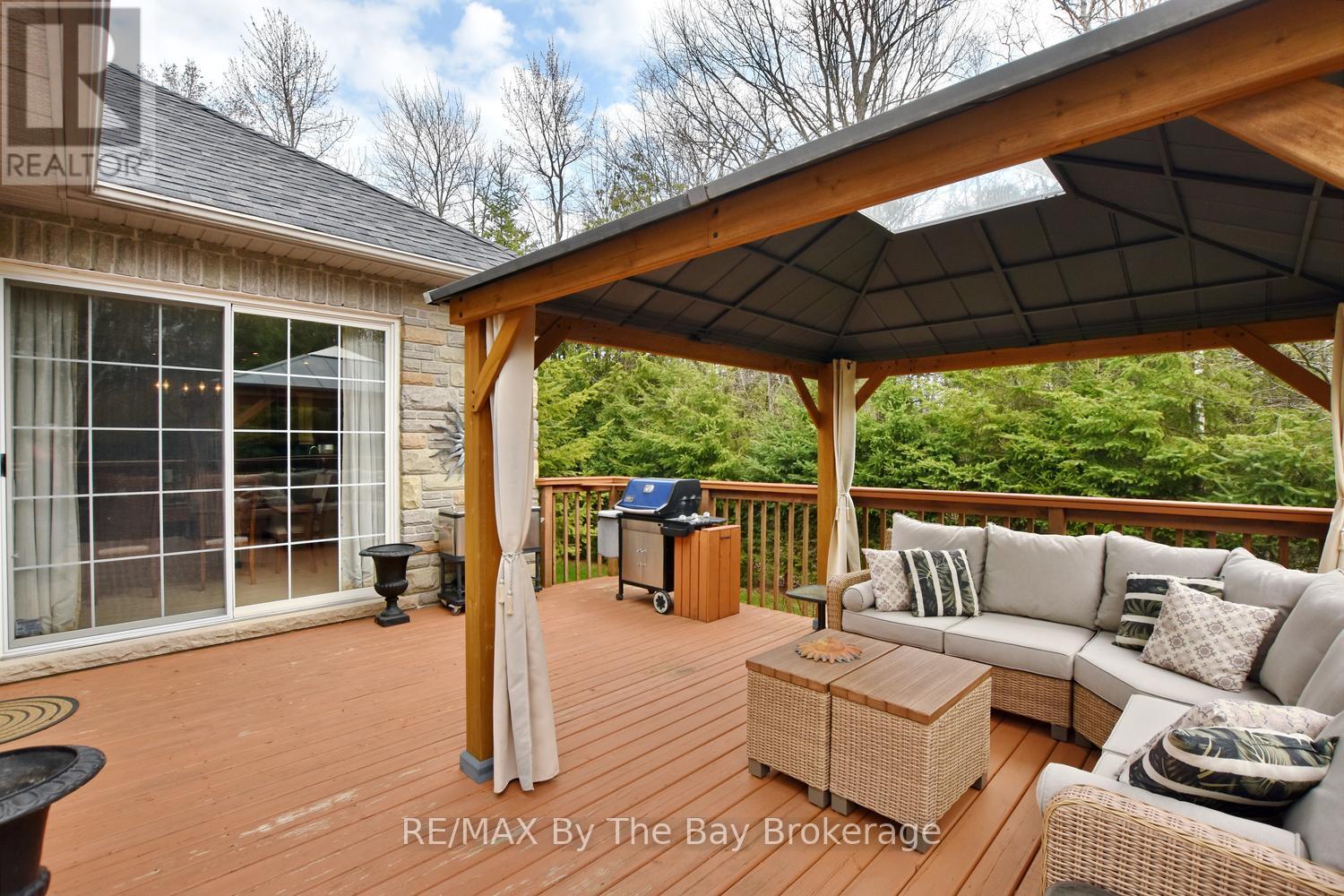 Private Deck with Access to Sunroom and Dining