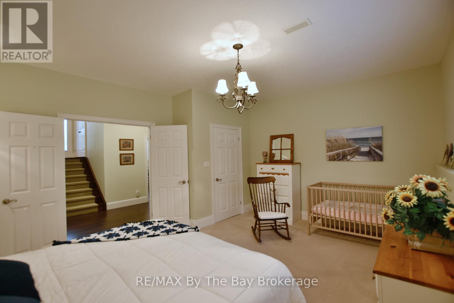 Large Double Doored Lower Level Bedroom