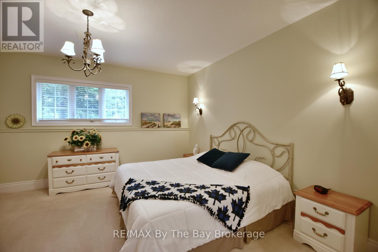 Lower Level Bedroom with Large Above Grade Windows