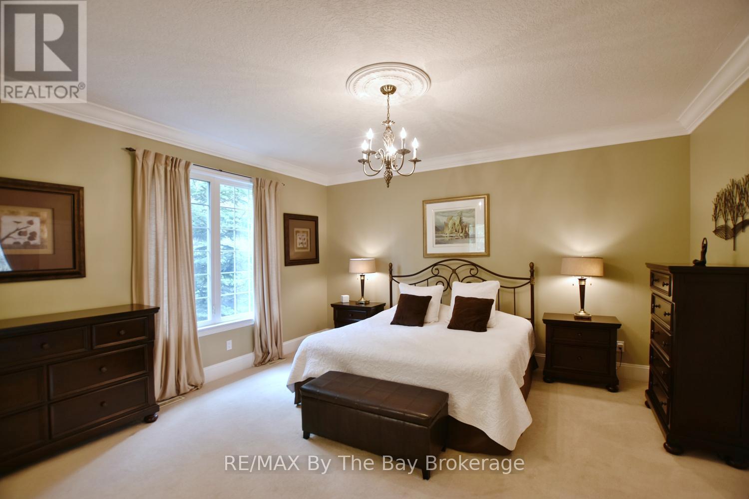 Primary Bedroom with Walk-In Closet and Ensuite