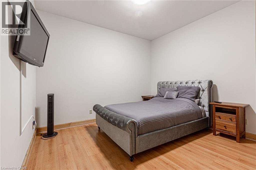 Neutral white walls paired with wood-finish flooring