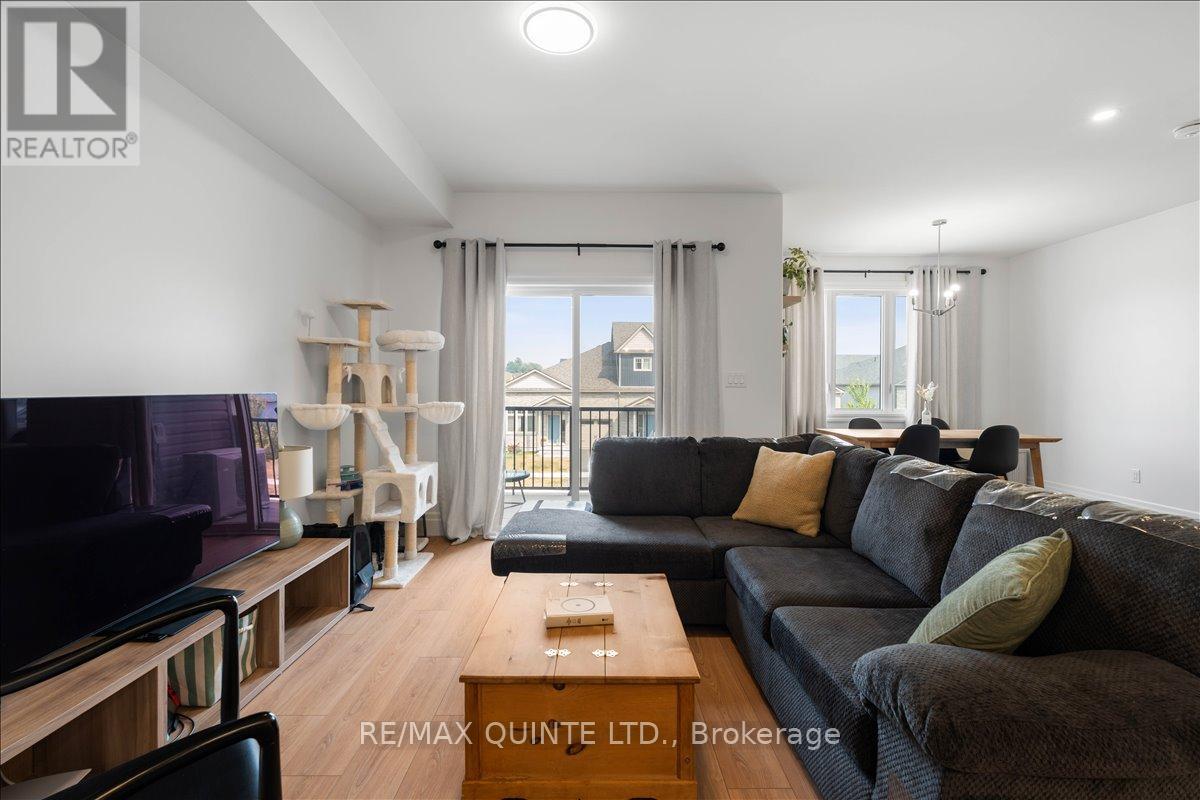 living room with sliding doors to private balcony