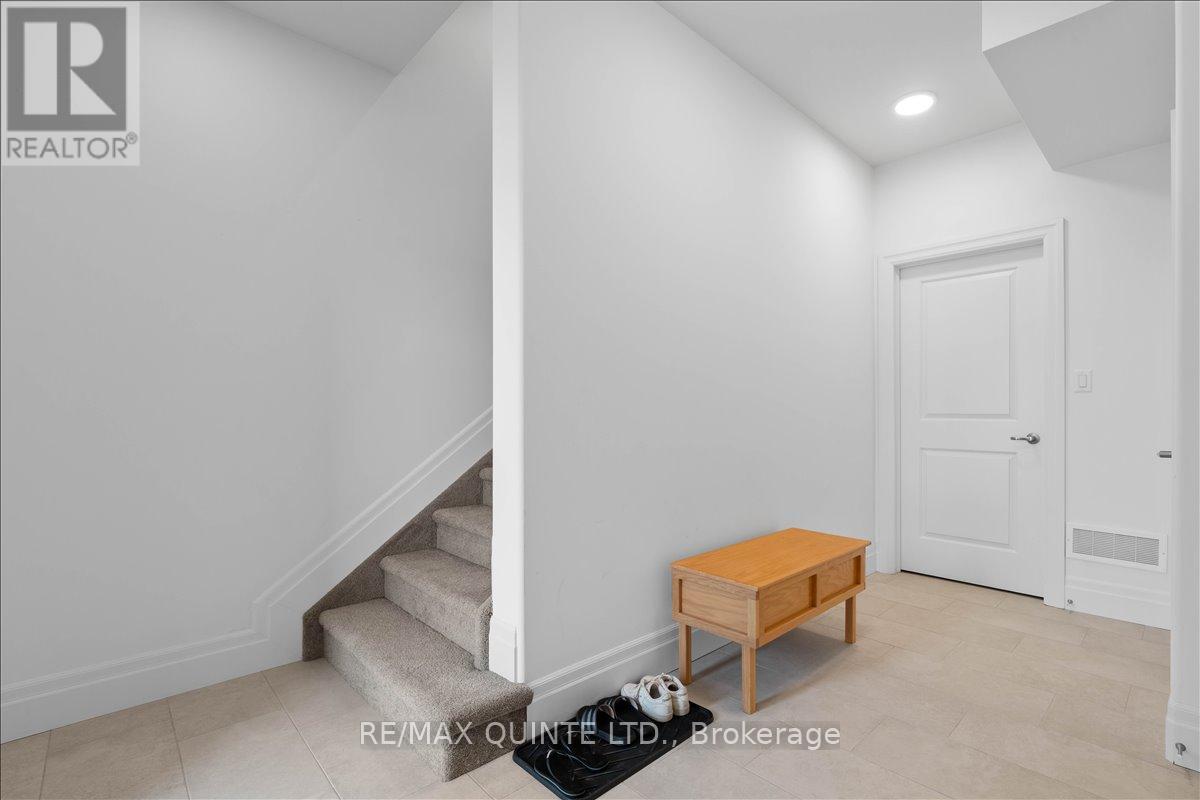 main floor entryway with utility room