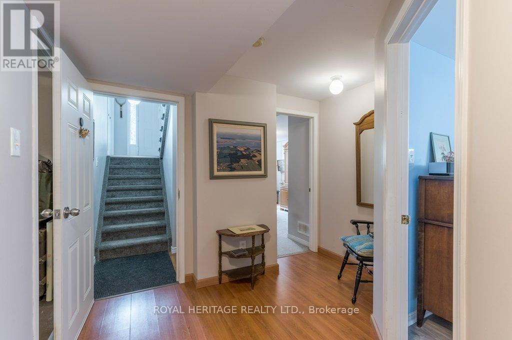 STAIRS AND DOOR FROM MAIN FLOOR TO BASEMENT