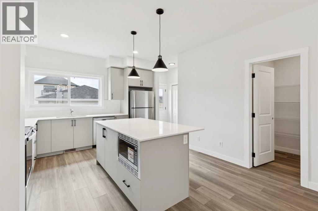 244 Drystone Walk NW — photo 15