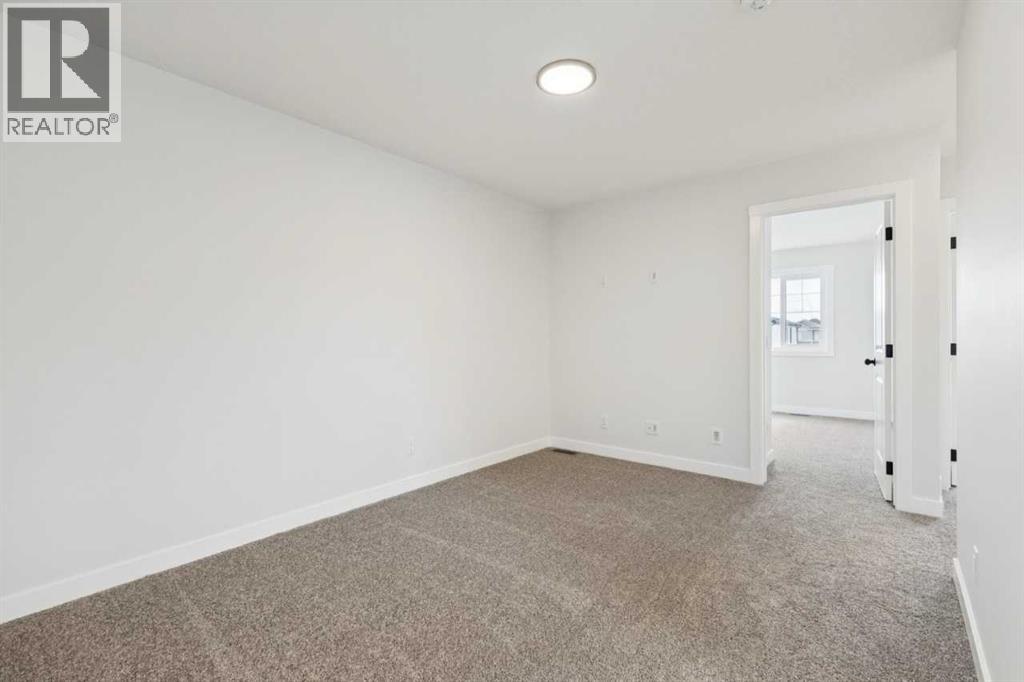 244 Drystone Walk NW — photo 24