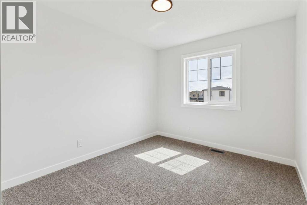 244 Drystone Walk NW — photo 35
