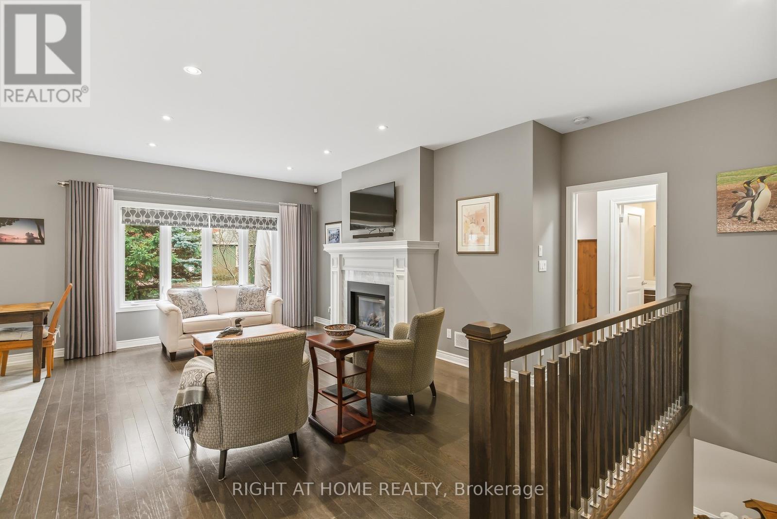 Custom spindles/fireplace, hardwood floors