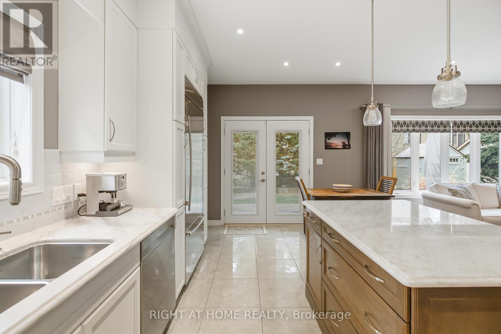 Direct Walk-out to outdoor patio, kitchen