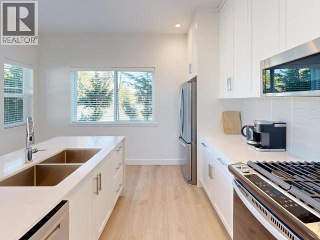 #104 7175 DUNCAN STREET - Image 2