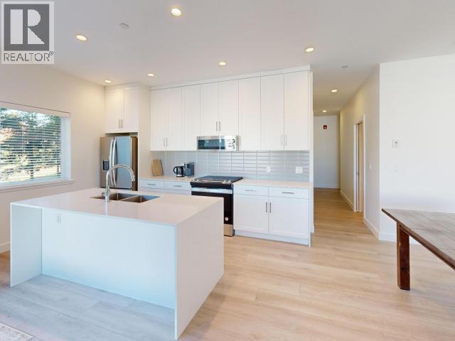 #104 7175 DUNCAN STREET - 4