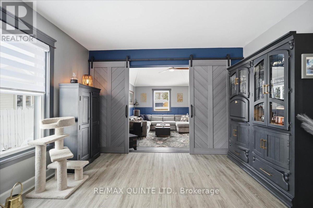 Living room with sliding doors to family room