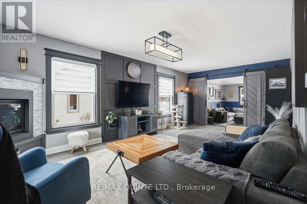 Living room with sliding doors to family room