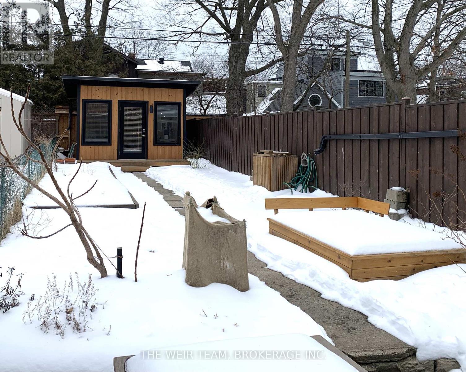 Large backyard with accessory building