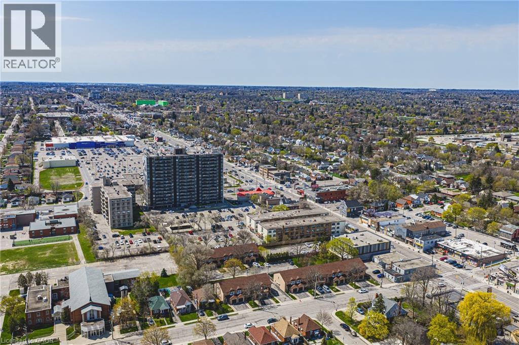 Expansive aerial perspective showcasing a commercial and residential district