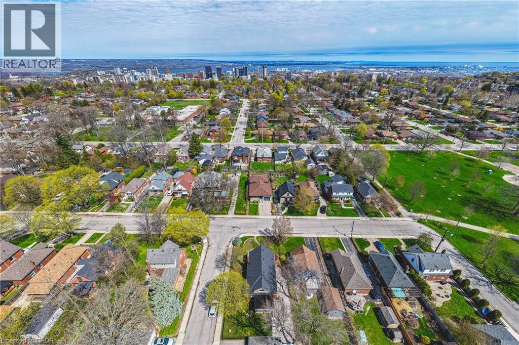 Aerial perspective showcasing a residential neighborhood with a mix of single-story and two-story homes