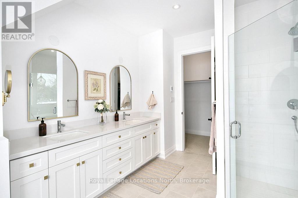 Expansive Bathroom With Glass Shower