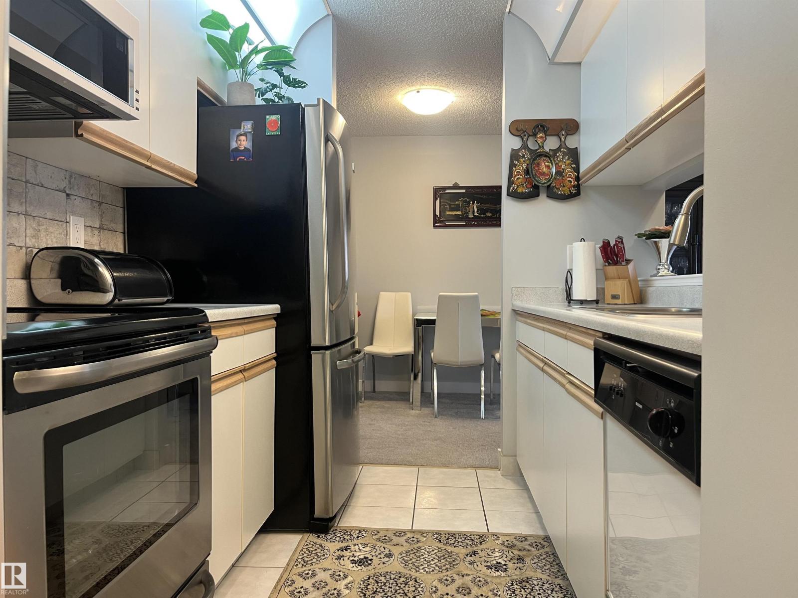 #302 17467 98A AV NW - 9