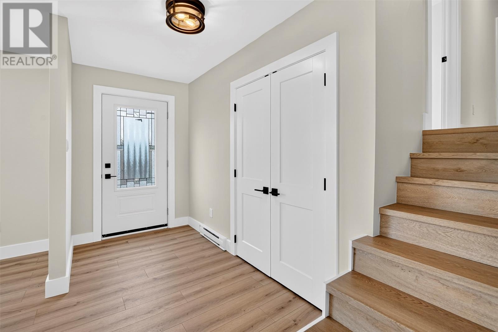 Foyer and stairs to Bedroom area