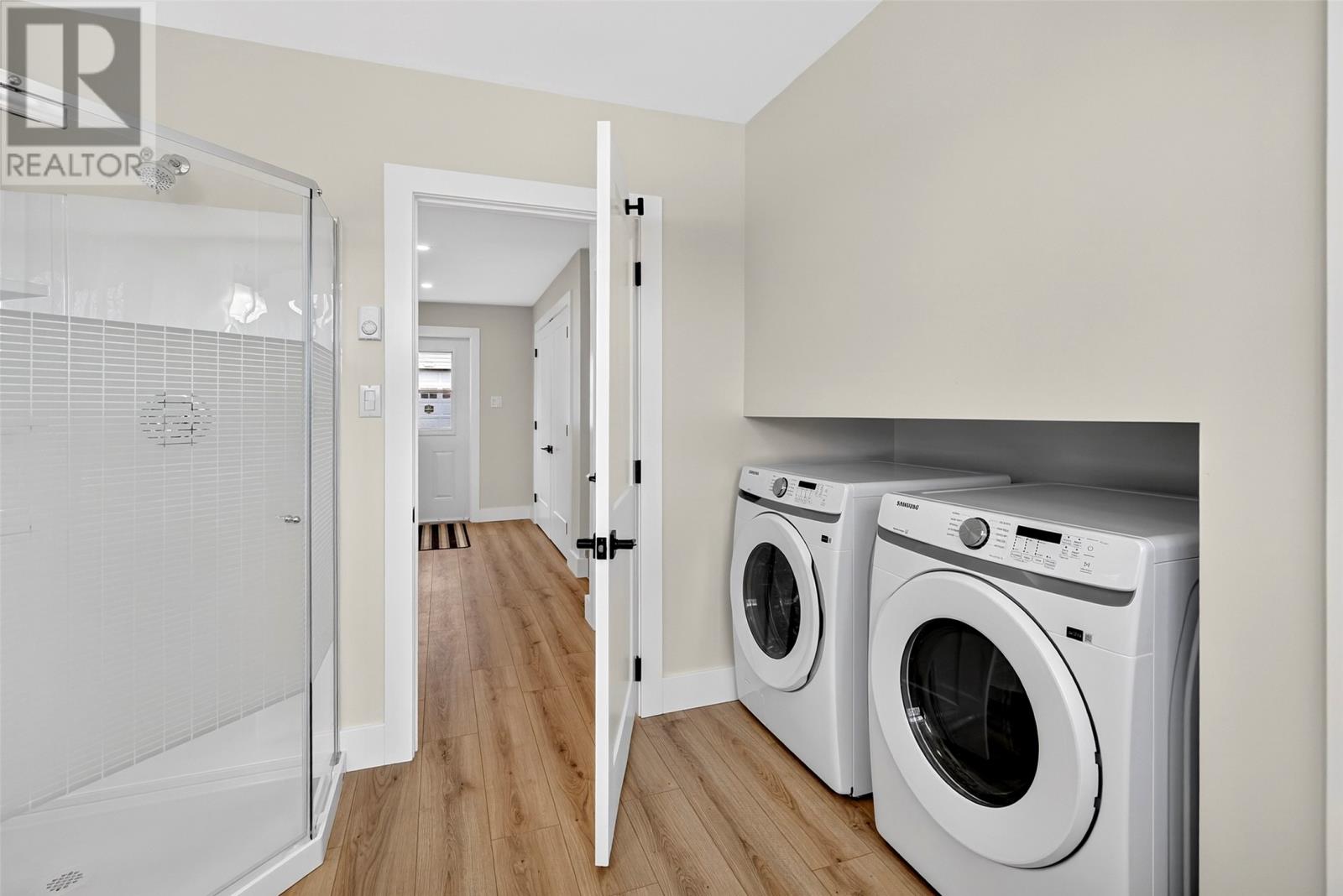 Main Floor Bathroom with Laundry Area with washer and dryer included
