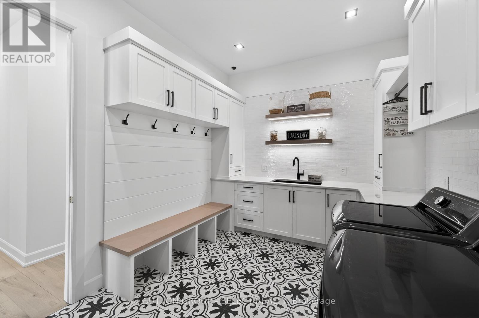 Laundry with sink and counter