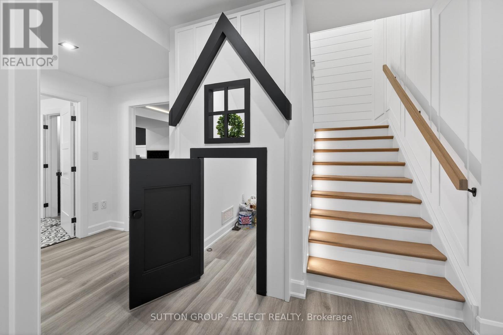 Stairs down into lower; custom play house